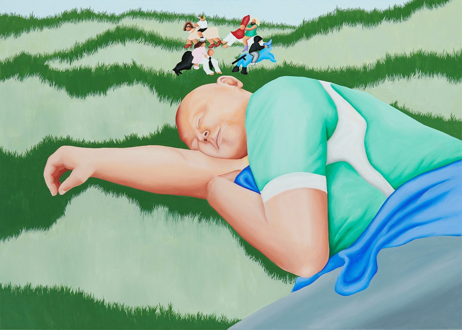 Bardzo duża postać mężczyzny leżącego na trawie.