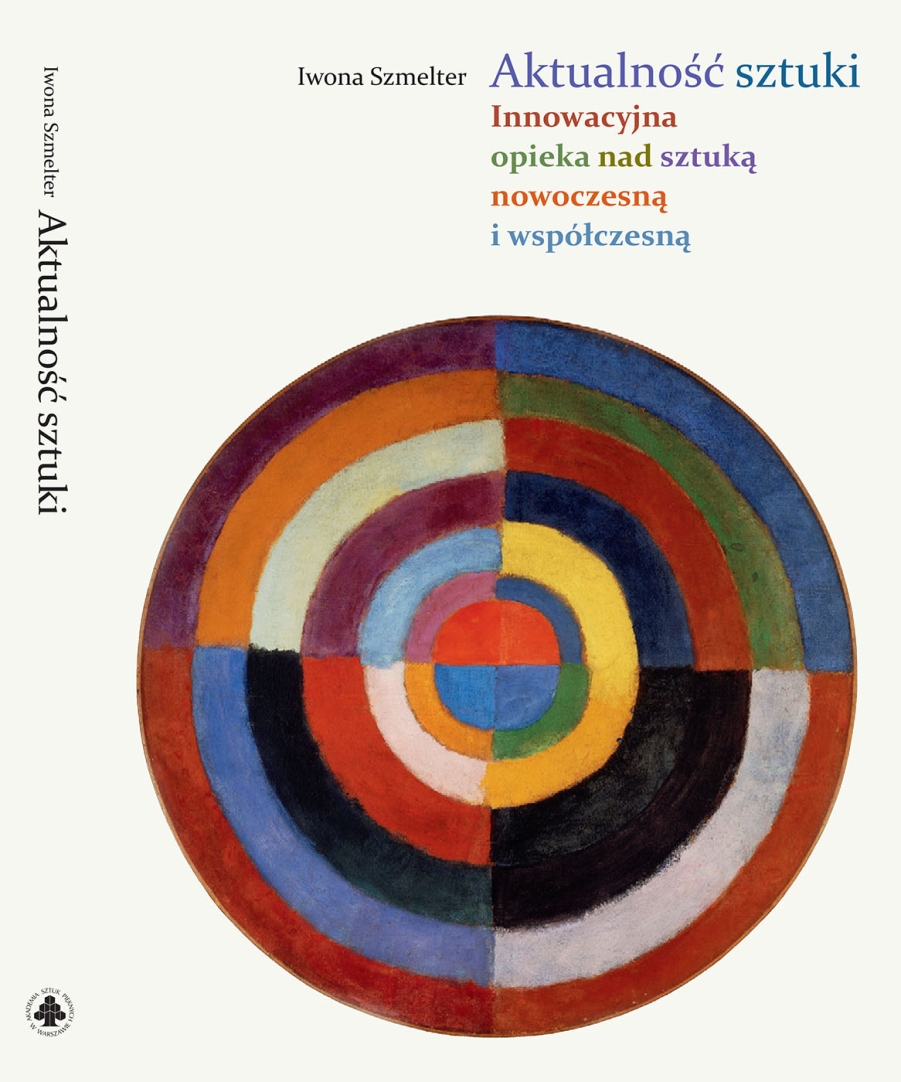 okładka książki z kolistym, kolorowym elementem graficznym