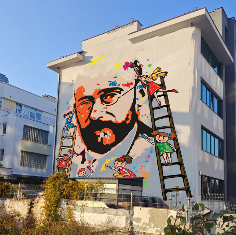 budynek z muralem przedstawiającym głowę brodatego mężczyzny